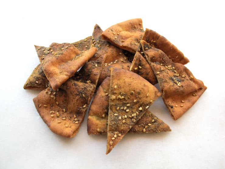 Close-up of Baked Pita Chips sprinkled with black and white sesame seeds