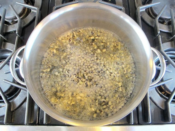 Boiling black-eyed peas on a pot on the stove