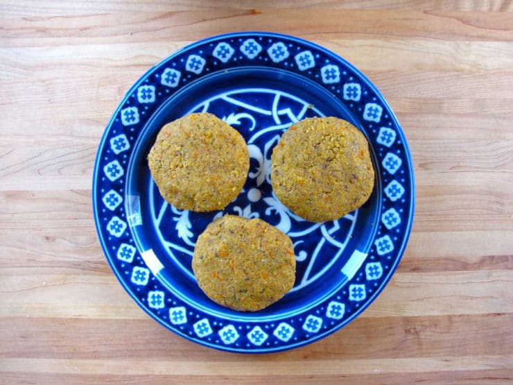 Black eyed pea patties on a plate.