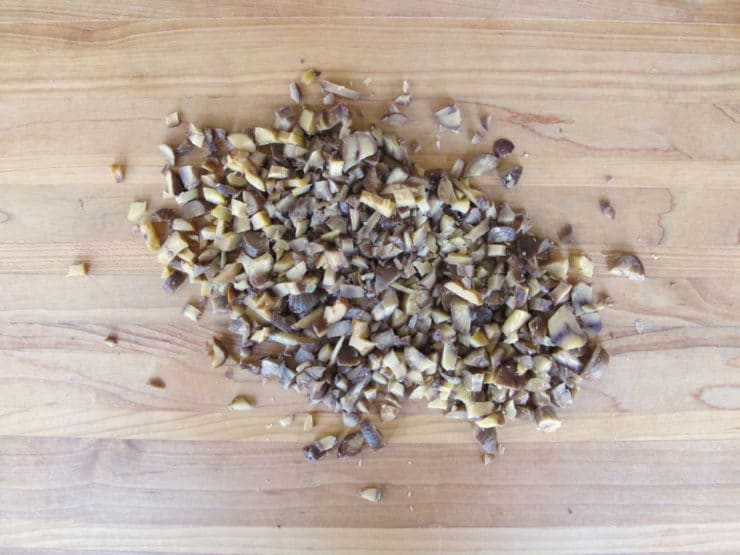 Diced chestnuts on a cutting board.