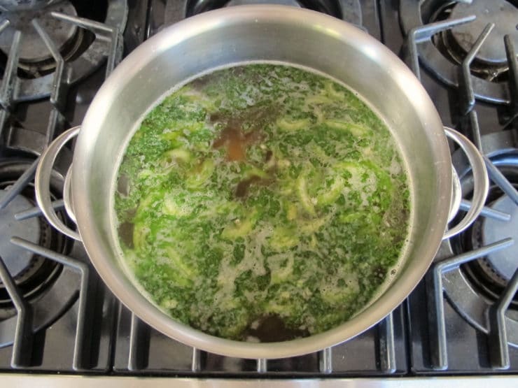 Simmering soup on the stove.