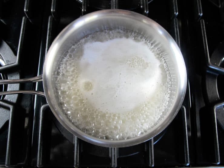 Cooking rice in a saucepan.
