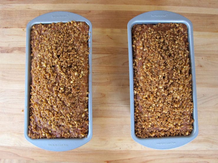 Two loaf pans of baked cake.