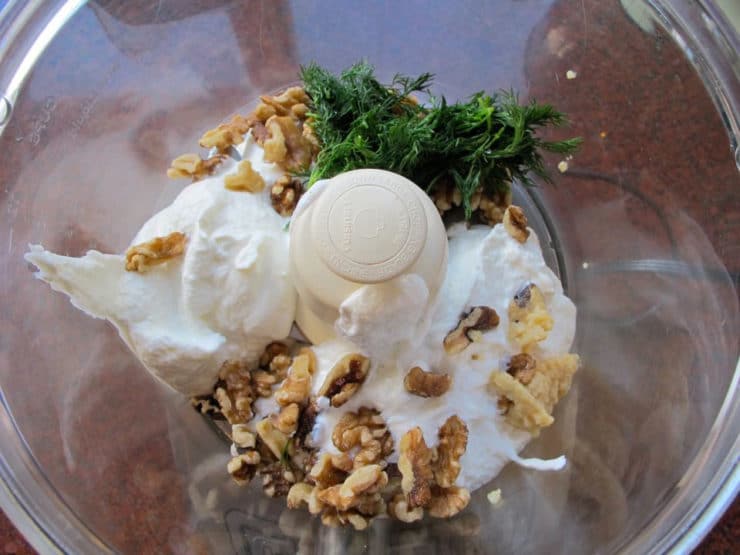 Greek yogurt and seasonings in the food processor.