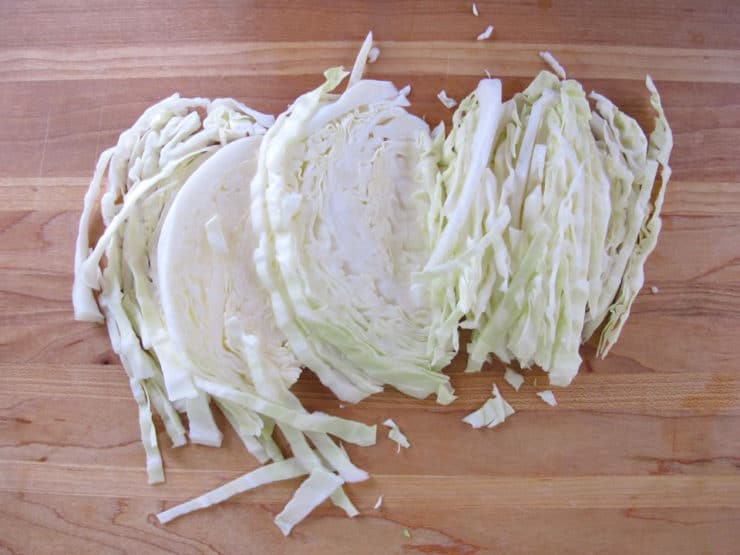 Freshly chopped cabbage on a cutting board