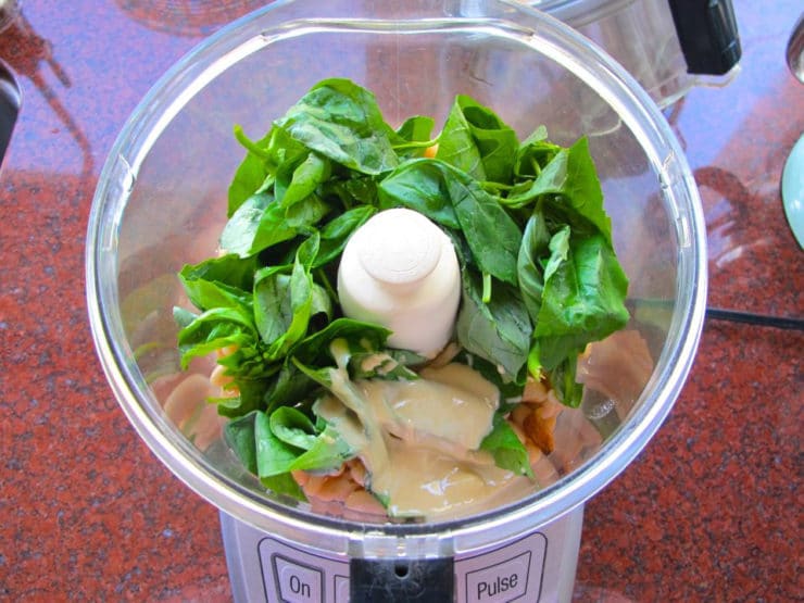 White bean hummus ingredients in bowl of food processor.