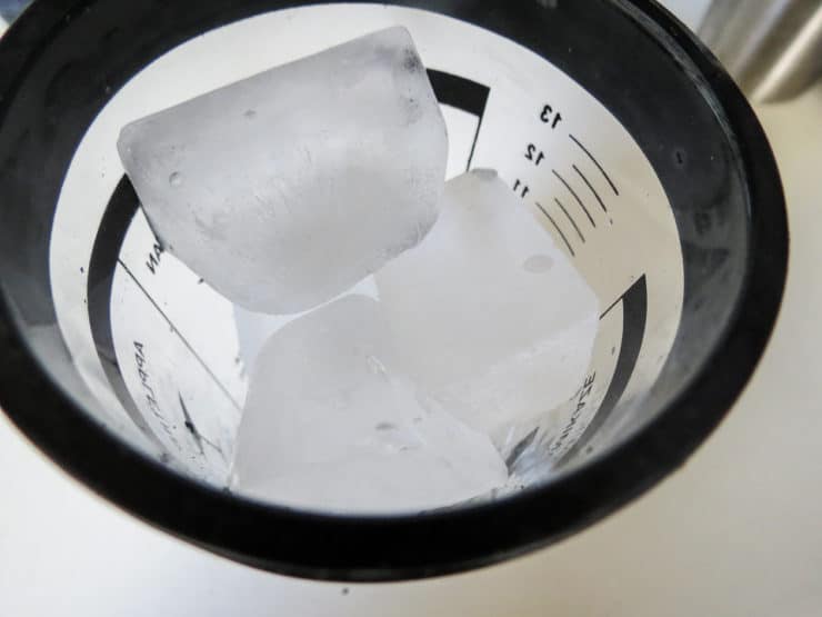 Ice in a drink shaker.