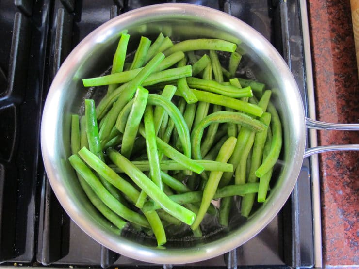 Skillet Seared Lemon Green Beans with Cotija Cheese - Easy flavorful vegetable side dish recipe on ToriAvey.com