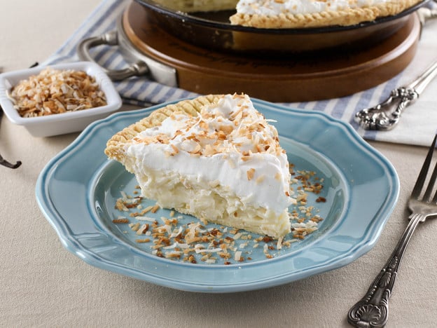 Coconut Cream Pie – Flaky All-Butter Crust Filled with Coconut Cream and Topped with Lightly Sweetened Whipped Cream and Toasted Coconut. Nostalgic, Family-Inspired Recipe from Kelly Jaggers.