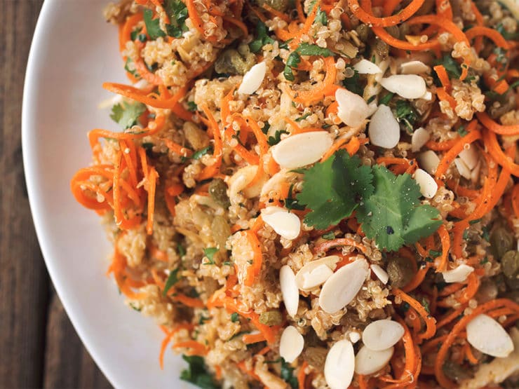 A vibrant Moroccan Quinoa Carrot Salad with cashews, featuring a refreshing mix of carrots, almonds, and cashews