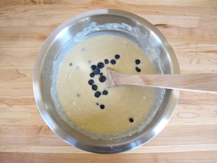 Blueberries stirred into pancake batter.