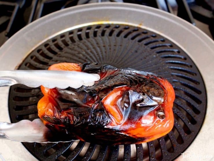 Red bell pepper on grill pan.