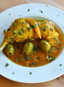 A traditional Moroccan dish featuring tender chicken cooked with tangy lemon and briny olives