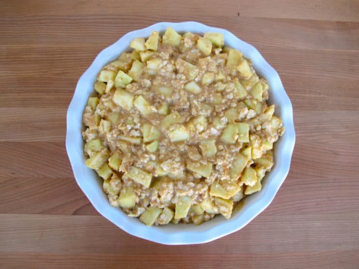 Apple mixture in a deep dish pie plate.