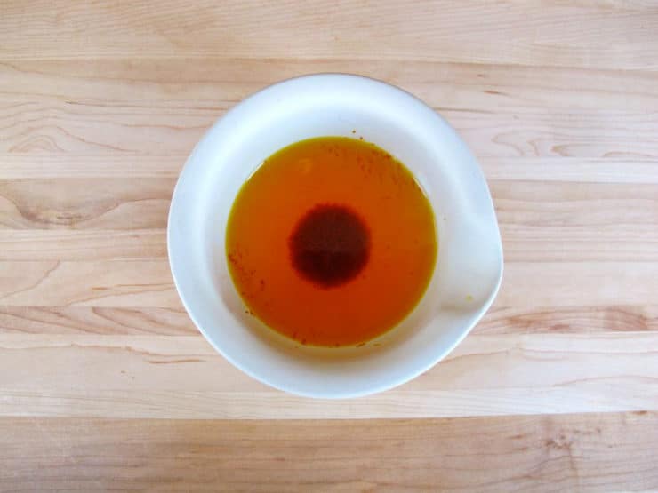Saffron threads soaking in water.