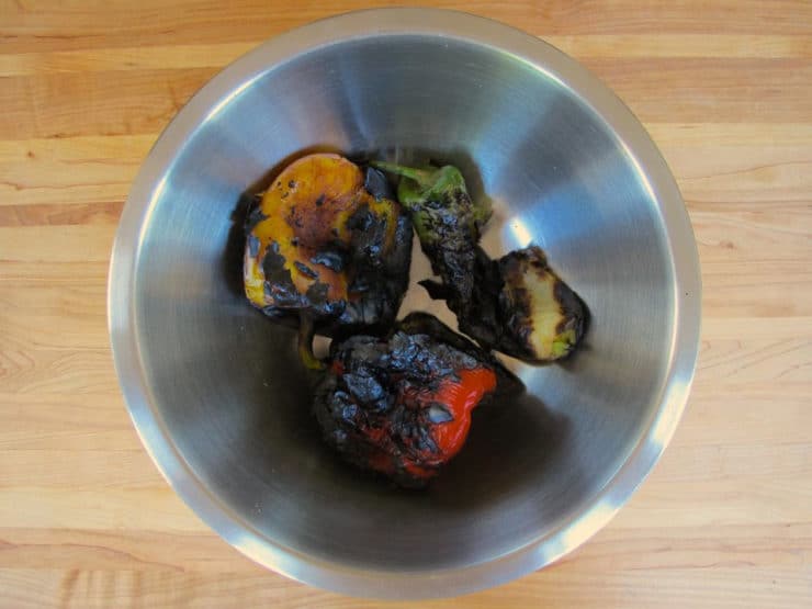 Roasted peppers in a bowl.