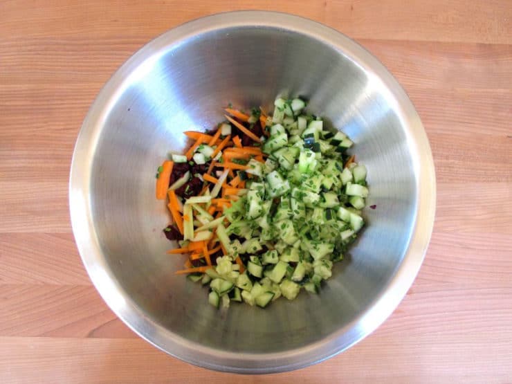 Diced vegetables in a mixing bowl.