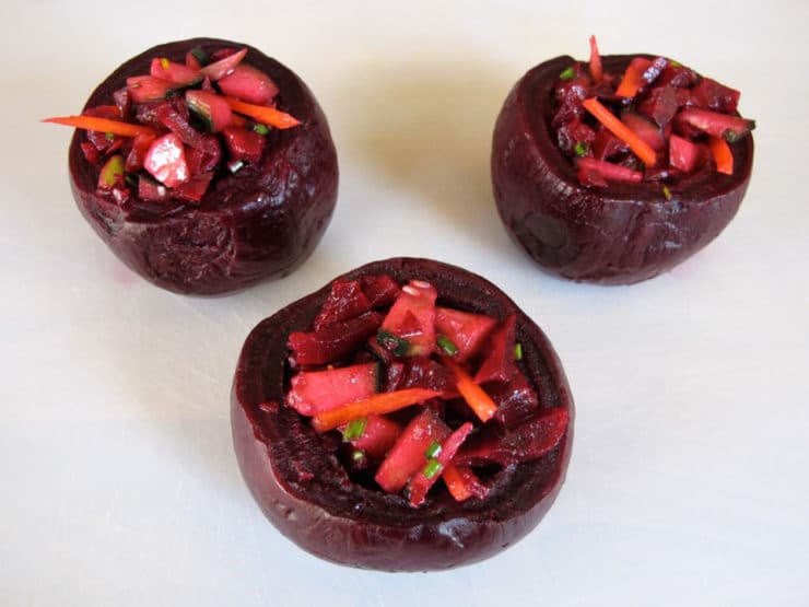 Beet salad stuffed into beet bowls.