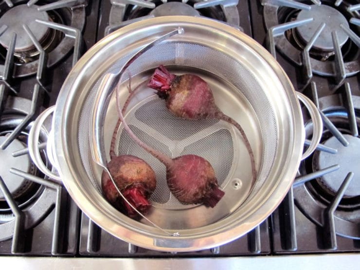 Cleaned beats in a steamer basket.