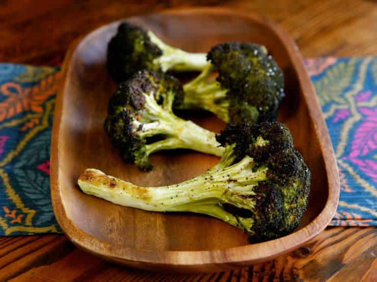 How to Roast Broccoli in Florets & Stalks - Learn to roast broccoli with olive oil, salt and pepper as whole stalks or in bite-sized florets with this step-by-step tutorial.
