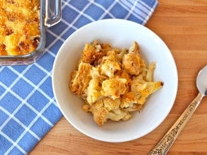 Overhead shot of a delicious dish made with roasted cauliflower, creamy cheese sauce, and a crispy breadcrumb topping