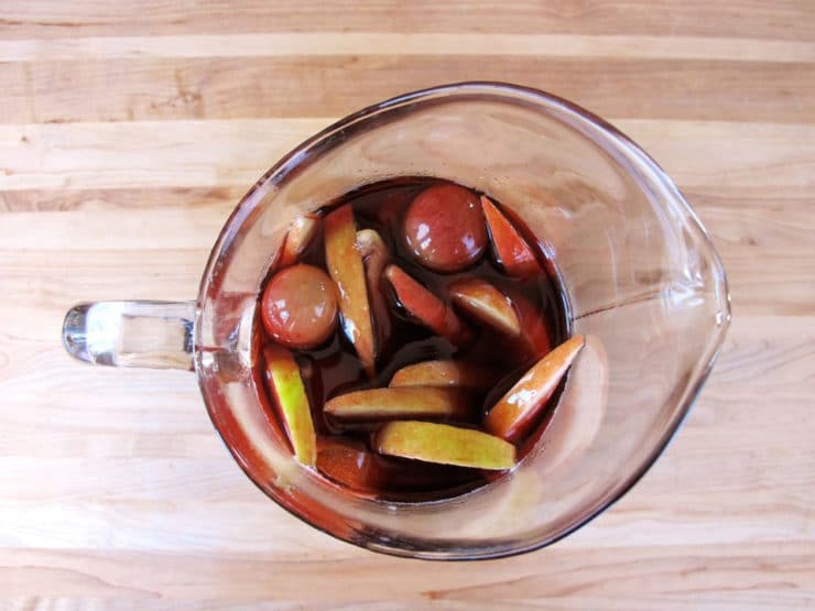 Top view of Thanksgiving sangria in a glass pitcher.