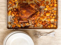 Weeknight Roast Chicken with Potatoes from David Leite - Recipe for roast chicken with red pepper paste and roasted potatoes. A great dish for your family any night of the week. Kosher for Passover.