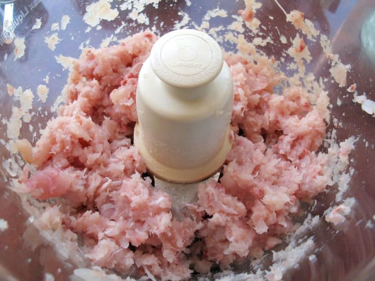 Pulsing fish in a food processor.