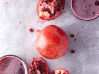 Pomegranate and glasses of freshly squeezed pomegranate juice recipe