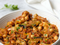 Mnazaleh served in a white bowl. Pinterest Pin at ToriAvey.com