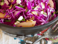 Red Cabbage Apple Salad Pinterest Pin - Unique and Delicious Salad Recipe with Toasted Walnuts, Dates and a Tantalizing Creamy Dressing
