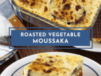 Slice of Roasted Vegetable Moussaka on a small plate in front of casserole dish with moussaka, fork, cloth napkin and serving utensil on wooden tabletop.